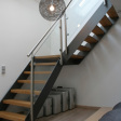 Treppe, Kombination aus Holz Metall und Glas